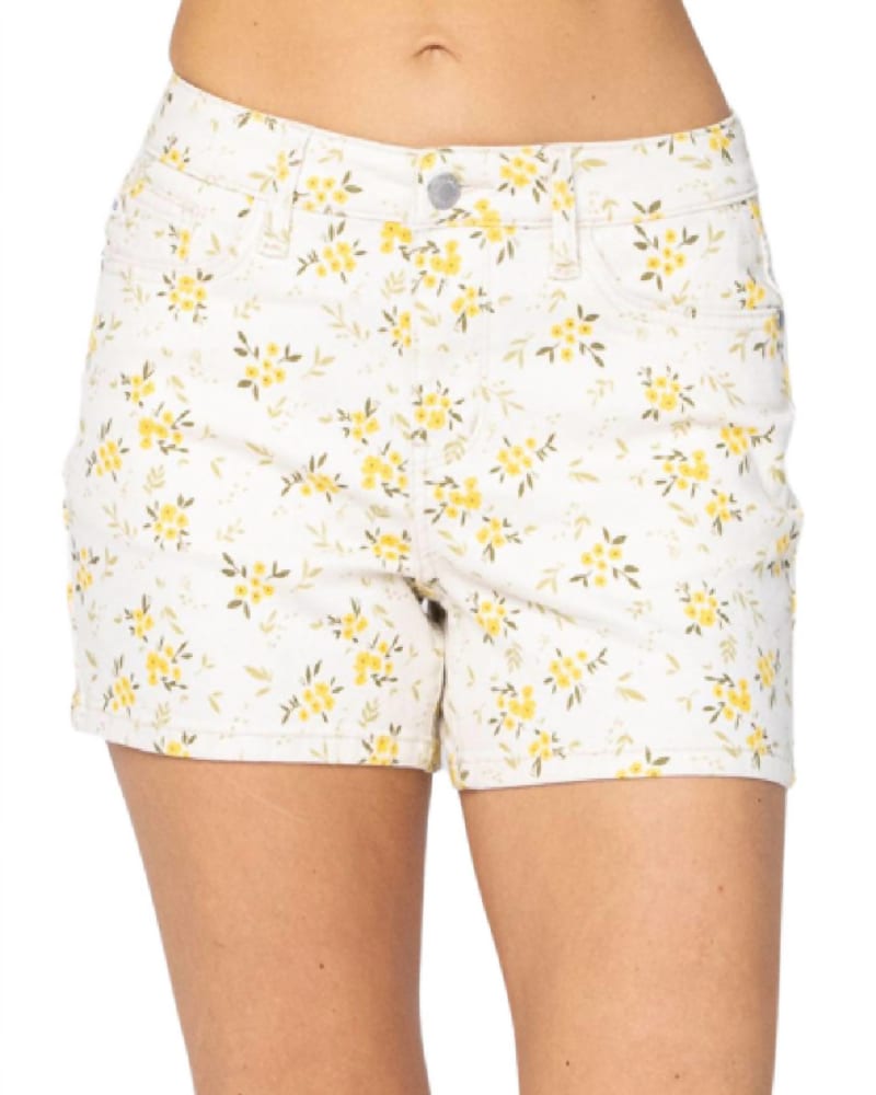 Front of a model wearing a size 2XL Flower Print Mid-Rise Shorts In Multi in Multi by Judy Blue. | dia_product_style_image_id:353356